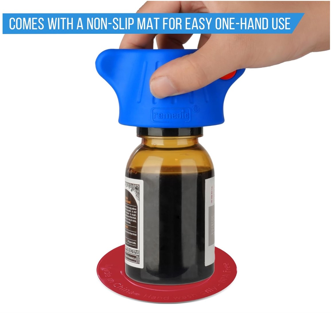 A persons hand holding a blue, hard rubber gripping device placed over a medication bottle with a red gripping mat under the bottle