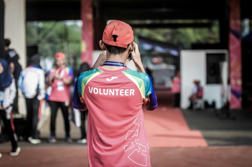 picture of a volunteer's back of shirt that says volunteer