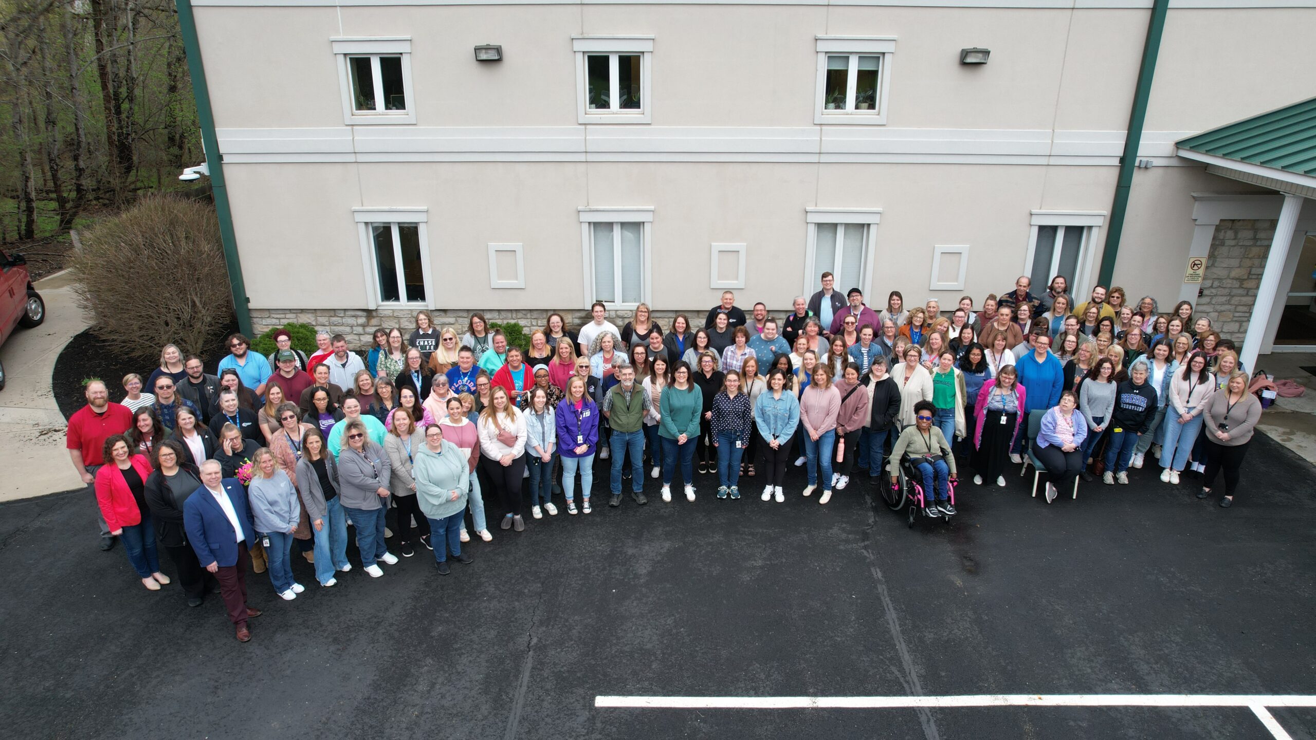 all the members of Fairfield DD , around 160 people, standing in front of the Pickerington Regional Office.