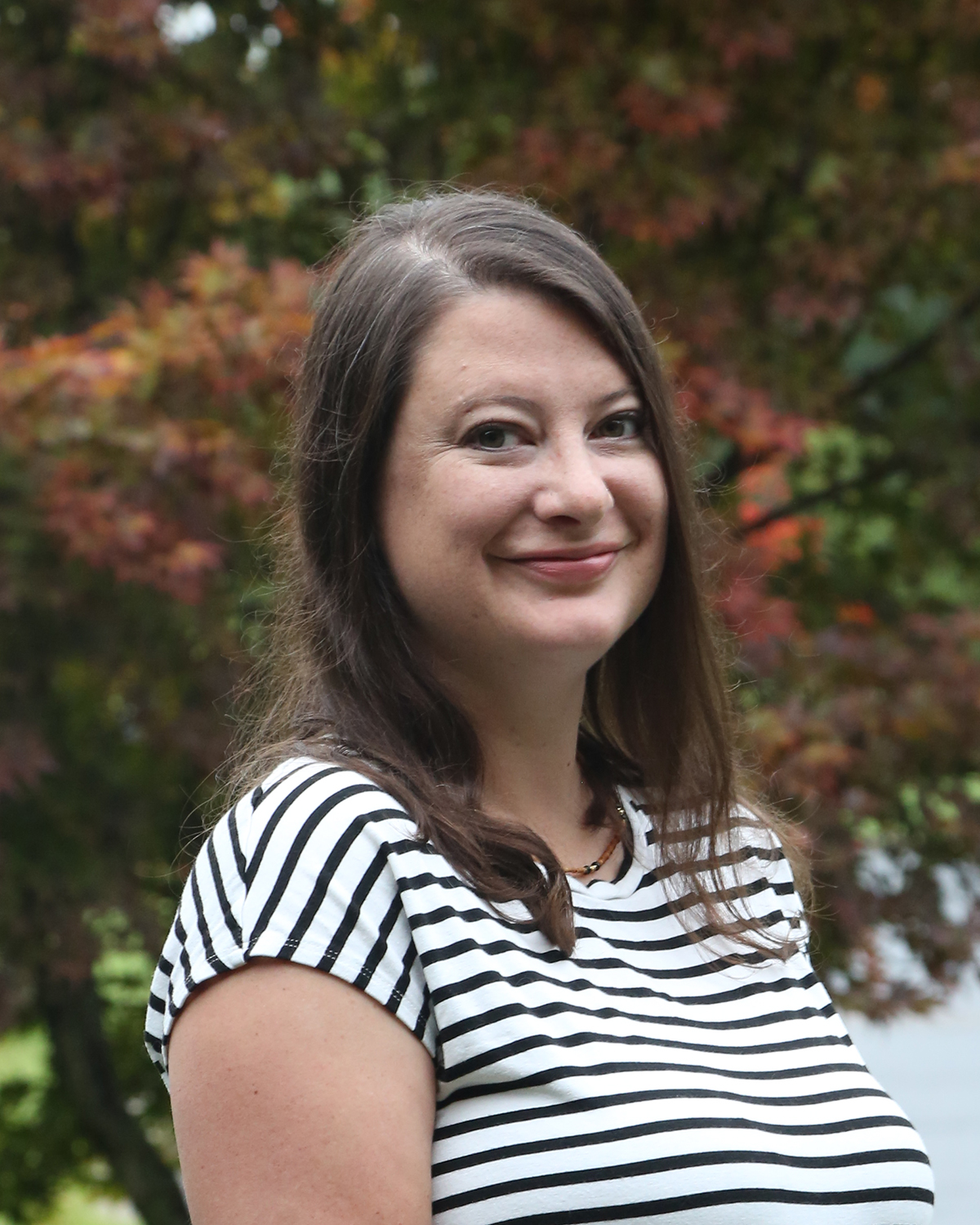 dark haired smiling woman