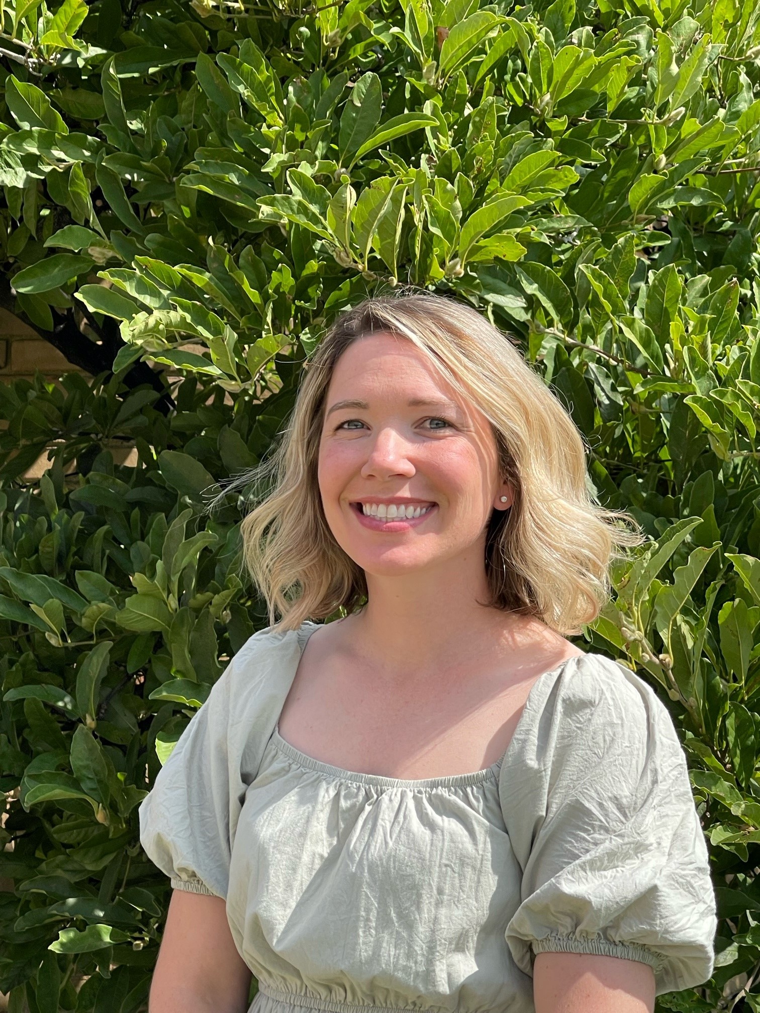 picture of woman with blonde hair smiling