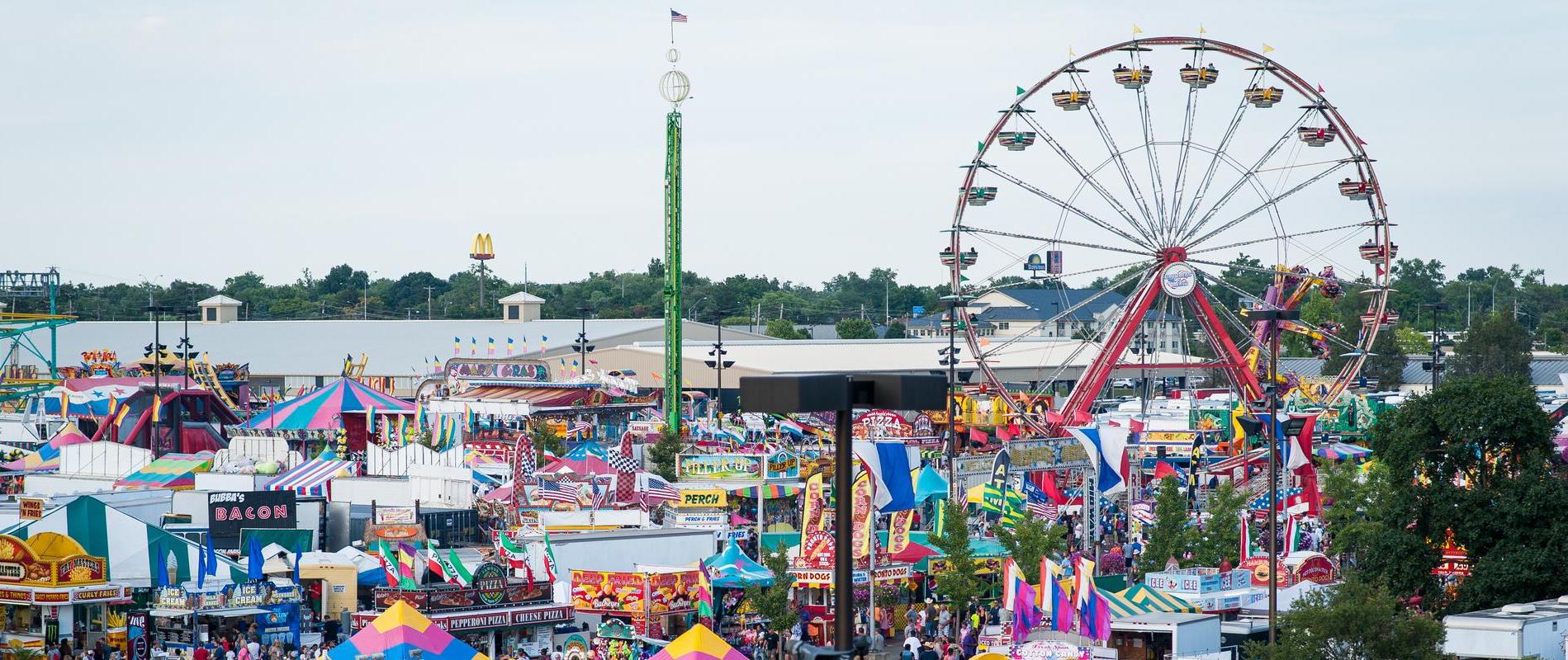 picture of the Ohio state fair with games and buildings