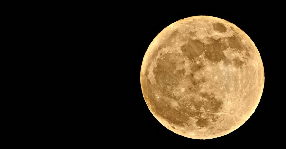 Photo of a full moon at night
