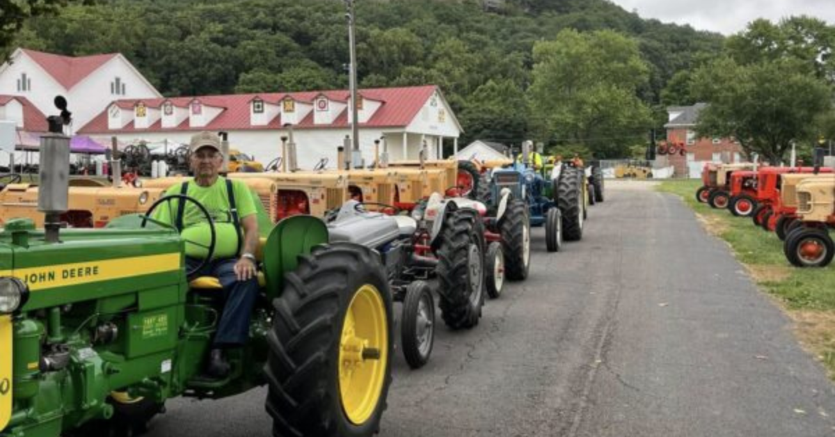 Photo of a man on a tractor at the Fairfield County Fairgrounds.
