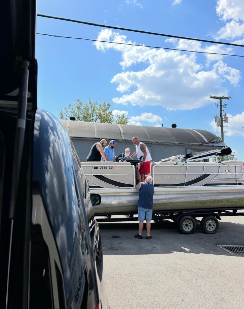 Michael getting on the boat at Buckeye Lake