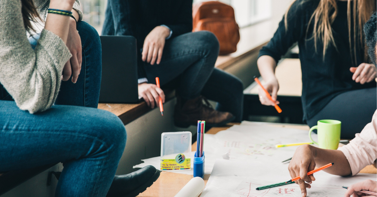 Stock photo of a group of people collaborating on a project.