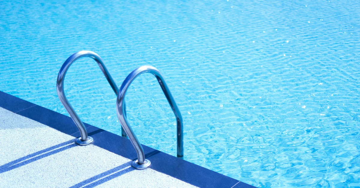Stock photo of a pool and ladder.